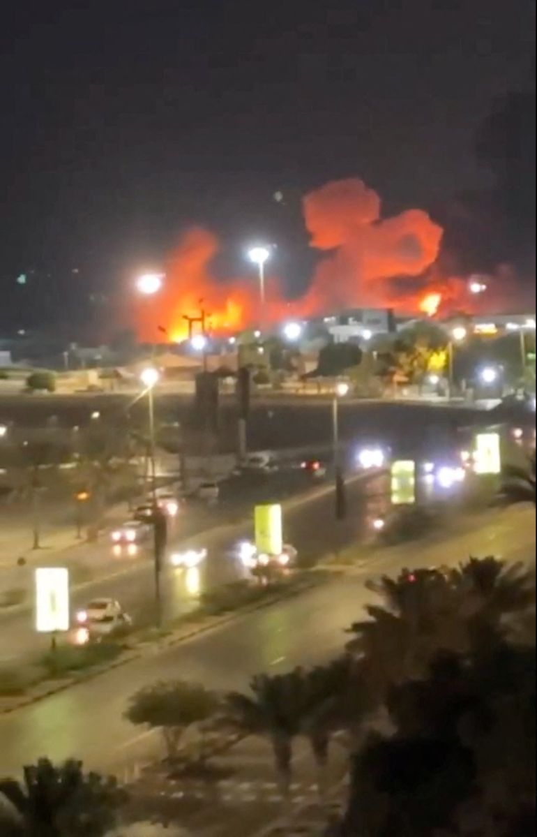 reuters_6a4f663a-1783588410 Smoke and flames rise after an explosion in Bandar Abbas, Hormozgan Province, Iran, in this screengrab obtained from a social media video released on July 8, 2026. Social Media/ via REUTERS THIS IMAGE HAS BEEN SUPPLIED BY A THIRD PARTY. NO RESALES. NO ARCHIVES. NEWS USE ONLY. VERIFICATION: - Buildings, trees, road layout and business signage that matched the archive and satellite imagery of the road near the Haqani port - Date not verified but NASA FIRMS detected heat at Haqani Port around midnight of July 8, local time. - Iranian Media reported an explosion near the fishing pier and corroborating visuals showed the fire in the area - No old results were found posted online before July 8.