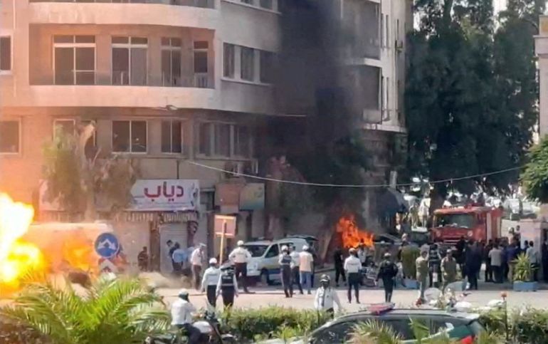 reuters_6a50b62d-1783674413 Emergency personnel work as smoke and fire rise at the site where explosive devices blew up near a hotel where French President Emmanuel Macron was meant to be staying, in Damascus, Syria, in this screengrab obtained from a video, July 7, 2026. REUTERS/Yamam Al Shaar TPX IMAGES OF THE DAY