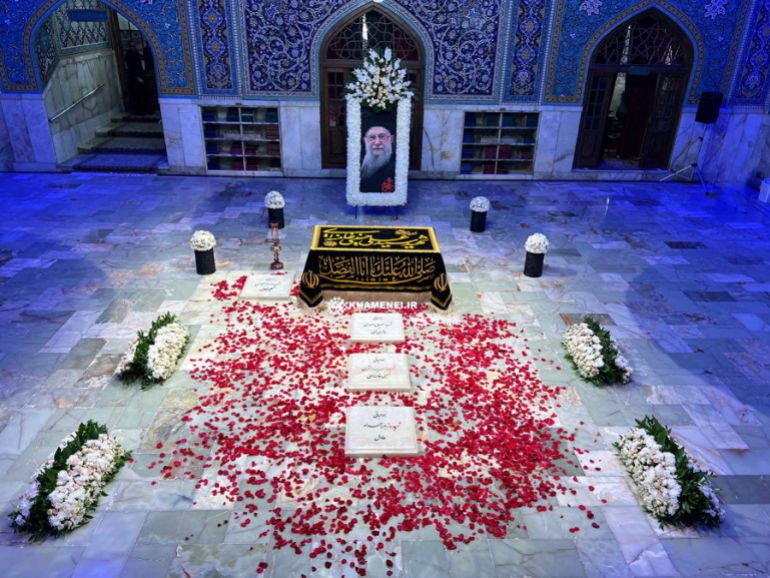 reuters_6a522460-1783768160 Iran's late Supreme Leader Ayatollah Ali Khamenei, who was killed on February 28 in Israeli and U.S. airstrikes, tomb in the Imam Reza shrine in Mashhadm, Razavi Khorasan, Iran in this handout image released on July 10, 2026. KHAMENEI.IR /Handout via REUTERS THIS IMAGE HAS BEEN SUPPLIED BY A THIRD PARTY. NO RESALES. NO ARCHIVES. ISRAEL OUT. NO COMMERCIAL OR EDITORIAL SALES IN ISRAEL. NO USE VOA PERSIAN. NO USE BBC PERSIAN. NO USE MANOTO. NO USE IRAN INTERNATIONAL. NO USE RADIO FARDA. VERIFICATION: Floor and wall tiles matched archive imagery of the Dar al-Zikr hall in the Imam Reza shrine where Khamenei was reportedly buried Exact date when the footage was filmed could not be verified No older versions found posted online before July 10
