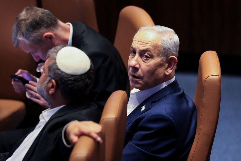 reuters_6a5a80ea-1784316138 Israeli Prime Minister Benjamin Netanyahu attends a session at the Knesset, Israel's parliament, before it dissolves ahead of the 2026 Israeli elections, in Jerusalem, July 16, 2026. REUTERS/Ronen Zvulun