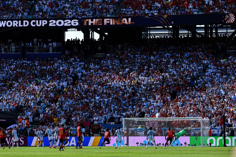 reuters_6a5e5837-1784567863 Jul 19, 2026; East Rutherford, New Jersey, USA; Argentina goalkeeper Emiliano Martinez (23) makes a save during the 2026 FIFA World Cup Final against Spain at New York New Jersey Stadium. Mandatory Credit: Vincent Carchietta-Imagn Images