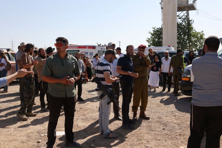 reuters_6a644fad-1784958893 Israelis gather during the funeral of 32-year-old Israeli reserve soldier Benayahu Mellet, who was killed in a shooting near the Palestinian village of Tal, in the Israeli settlement of Havat Gilad, near Nablus in the Israeli-occupied West Bank, July 24,2026. REUTERS/Naama Stern