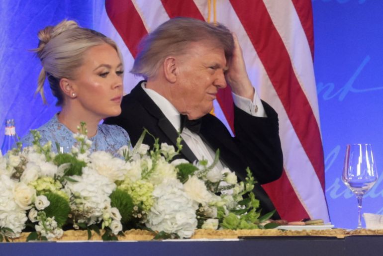 U.S. President Donald Trump reacts as mentalist Oz Pearlman performs at the White House Correspondents' Association (WHCA) Dinner, which was rescheduled from April after it was interrupted when a man tried to force his way through security and fired a shotgun, at the Waldorf Astoria hotel in Washington, D.C., U.S., July 24, 2026. REUTERS/Jonathan Ernst