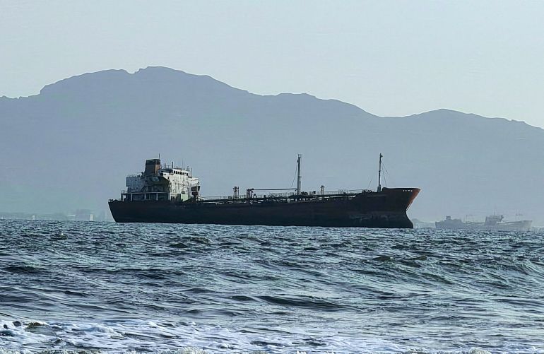 A ship off the port of Aden, where traffic remained steady after the Iran-aligned Houthis said their forces had carried out missile and drone strikes on Saudi oil tankers, in Aden, Yemen, July 23, 2026. REUTERS/Stringer