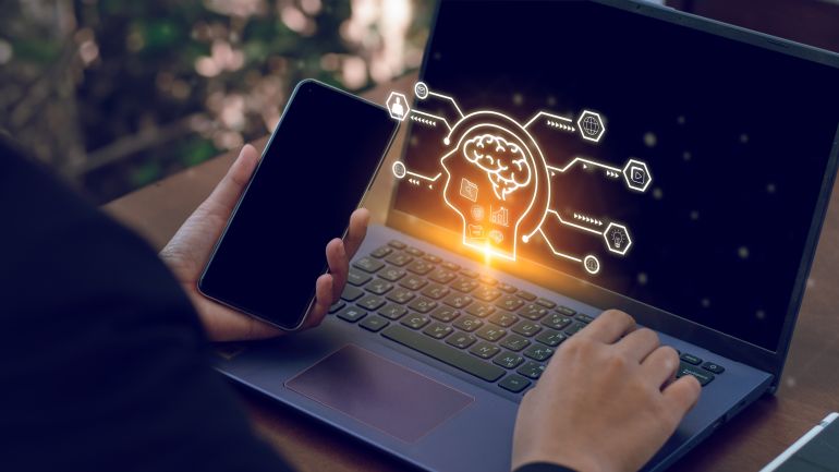 shutterstock_2411527519-1780677028 Ai technology, Artificial Intelligence. man using technology smart robot AI, artificial intelligence by enter command prompt for generates something, Futuristic technology transformation. Chat with A