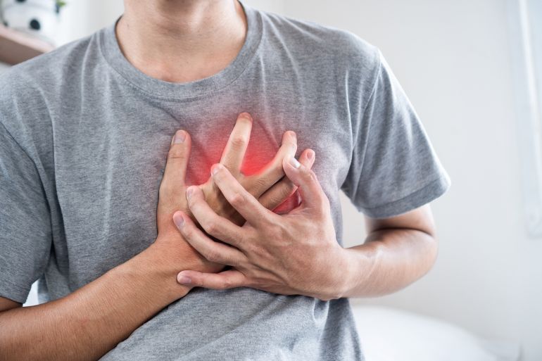 shutterstock_2655647269-1769182700 Asian Man holding His Chest with Both Hands, Showing Possible Symptoms of Heart Disease, Angina and heart attack of Cardiovascular Risk; Shutterstock ID 2655647269; purchase_order: aj; job: ; client: ; other: