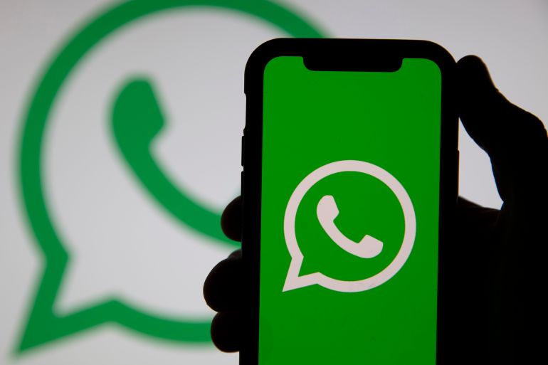 LONDON, UK - March 2021: Whatsapp online messaging service logo on a smartphone SS1933004243