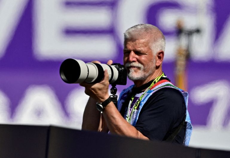 Formula One F1 - Hungarian Grand Prix - Hungaroring, Budapest, Hungary - July 26, 2026 Czech Republic president Petr Pavel takes photographs during the race REUTERS/Marton Monus TPX IMAGES OF THE DAY