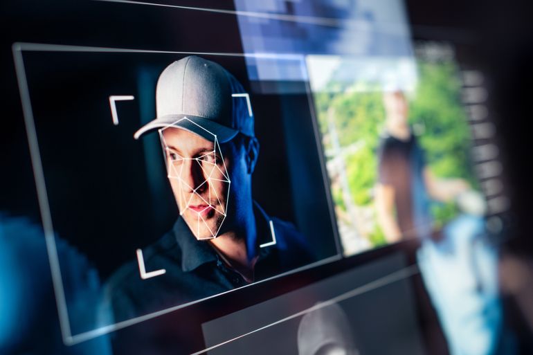 ui8hj-1769849112 Deep fake and AI deepfake. Theft or fraud video. Face recognition and photo detection with artificial intelligence. Machine learning and computer id analysis system technology.