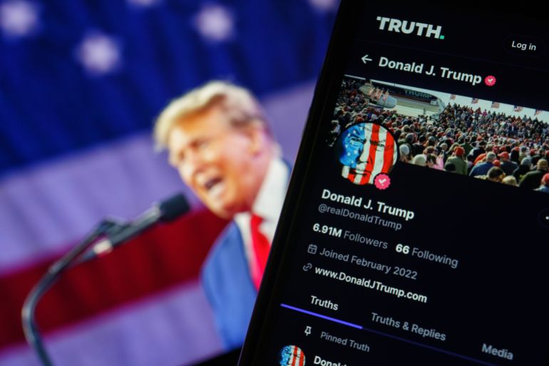 12134929-1721056570 epa11255982 A photo illustration of former US President Donald Trump's account on social media platform Truth Social shown on a mobile phone in Washington, DC, USA, 02 April 2024. Stock in the parent company, Trump Media and Technology Group, fell sharply in the last 48 hrs after the organisation reported loses of $58 million last year. EPA-EFE/WILL OLIVER