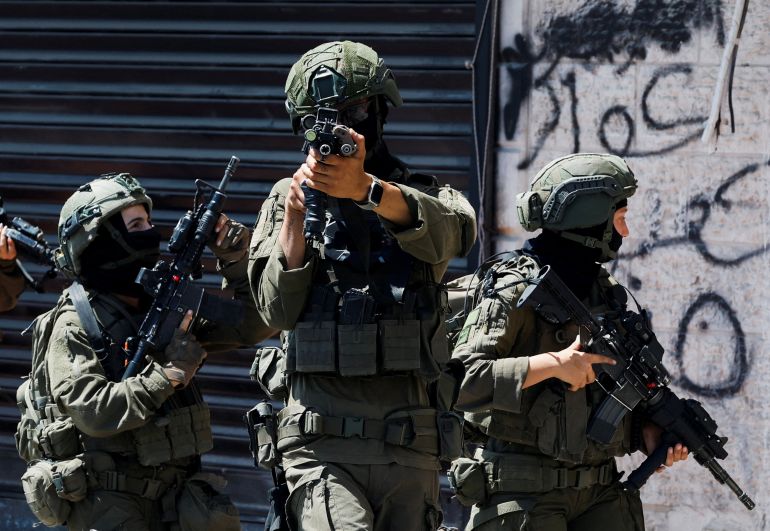 20a-raid-1785955833 Israeli forces take part in a raid in Qalandia refugee camp, in the Israeli-occupied West Bank, August 5, 2026. REUTERS/Mohammed Torokman TPX IMAGES OF THE DAY