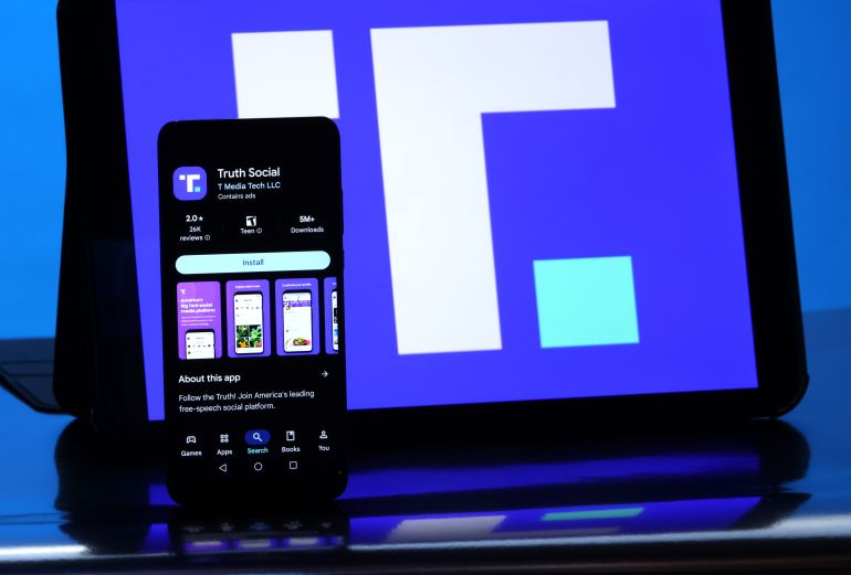 The logo for social media platform Truth Social, an American company owned by Trump Media & Technology Group, is shown on mobile devices. (Photo by Mike Campbell/NurPhoto)