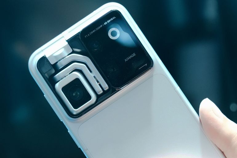 45776-1787059660 SHANGHAI, CHINA - JULY 20 2026: A view of Honor's robot phone exhibited at the World AI Conference in Shanghai, China, Monday, July 20, 2026. The smart phone features a four-degree-of-freedom robotic gimbal, which enables 360-degree subject tracking and AI-powered cinematic camera movements. (Photo credit should read LONG WEI/ Feature China/Future Publishing via Getty Images)