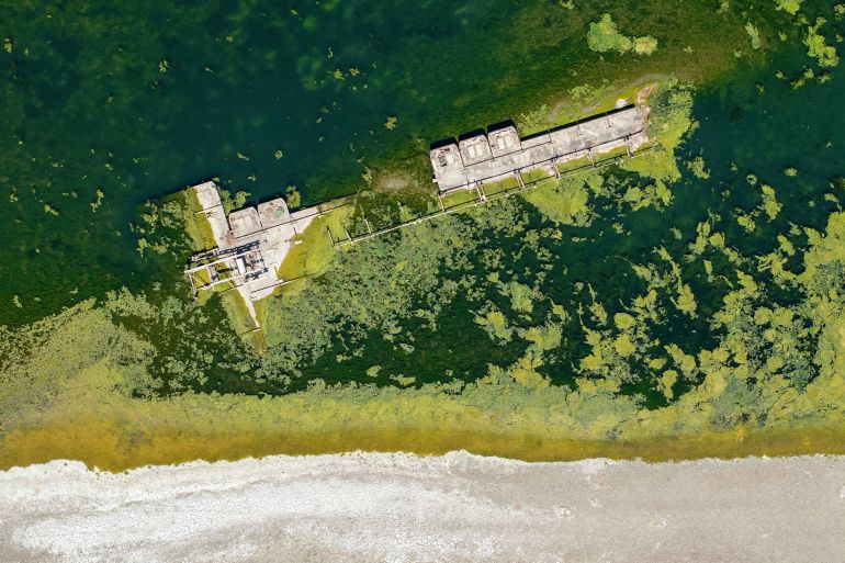 53-1786189108 A drone view shows a sunken German warship from World War II, exposed due to low Danube River levels caused by drought and extreme heat, in Prahovo, Serbia, July 30, 2026. REUTERS/Djordje Kojadinovic TPX IMAGES OF THE DAY