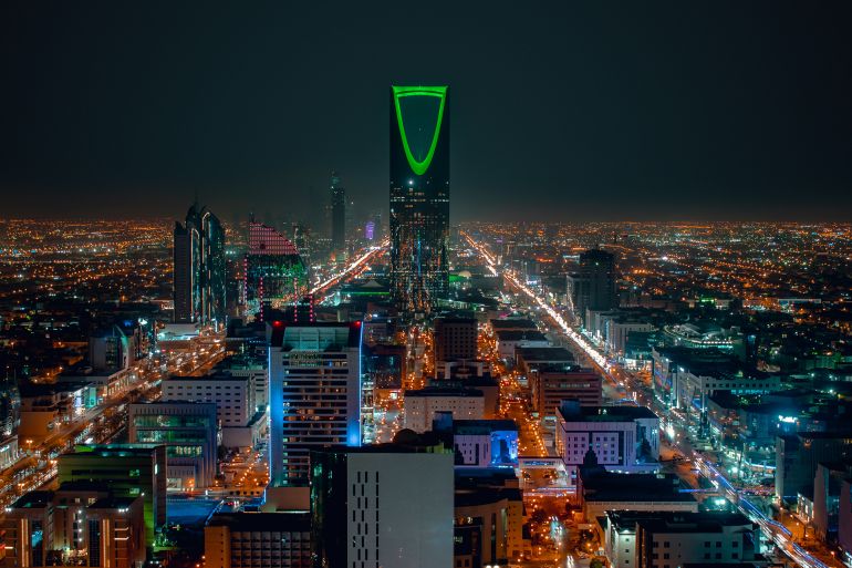 Saudi Arabia Riyadh landscape at night - Riyadh Tower Kingdom Centre - Kingdom Tower – Riyadh Skyline - Burj Al-Mamlaka – AlMamlakah – Riyadh at night by wajdram @ادوبي ستوك