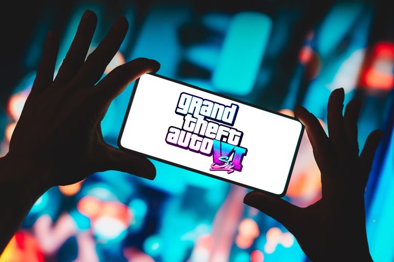 6798897-1787501418 December 5, 2023, Brazil. In this photo illustration, the Grand Theft Auto VI (GTA 6) logo is displayed on a smartphone screen. by Rafael Henrique @ادوبي ستوك