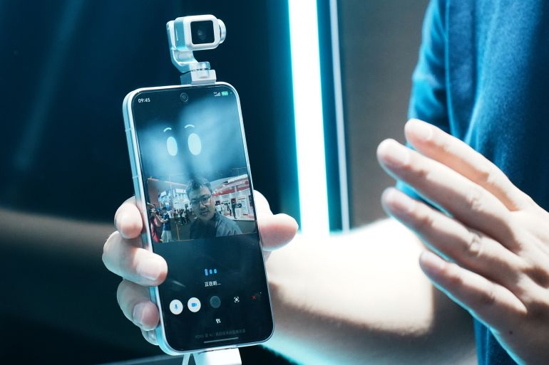 76986-1787059666 SHANGHAI, CHINA - JULY 20: The Honor Robot Phone is on show during the 2026 World AI Conference on July 20, 2026 in Shanghai, China. The 2026 World AI Conference and High-Level Meeting on Global AI Governance scheduled from July 17 to July 20 showcases exhibitions of smart devices, AI plus culture and entertainment experiences, and a wide range of cutting-edge AI products, among which a range of humanoid robots and AI-powered dexterous hands as one of the highlights. (Photo by Long Wei/VCG via Getty Images)