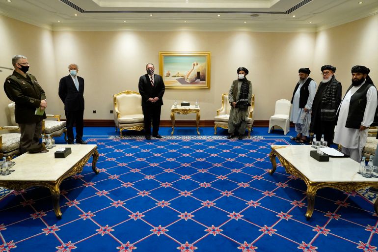 afp-7788774-1786983537 US Secretary of State Mike Pompeo (C-L) meets with Taliban co-founder Mullah Abdul Ghani Baradar (C-R) in the Qatari capital Doha on November 21, 2020, amid signs of progress in their talks as Washington speeds up its withdrawal. Pompeo's visit comes in the wake of a rocket attack which struck densely populated areas of Kabul, killing at least eight people in the latest outbreak of violence in the Afghan capital. The Taliban have denied responsibility while the Islamic State group claimed the deadly strike. (Photo by Patrick Semansky / POOL / AFP)