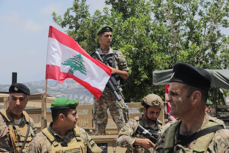 afp_6a6229c64bf4-1784818118 Lebanese soldiers patrol at the entrance to Zawtar al-Gharbiya on July 22, 2026, after the army deployed to the southern village.