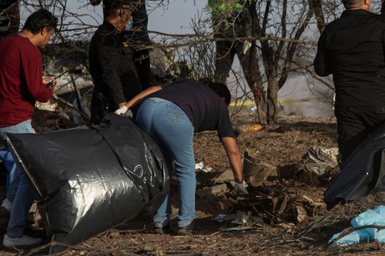 afp_6a6ea65390f8-1785636435 Police officers work at the scene of a small-plane crash in the Vista Alegre district of Nazca, Peru, on August 1, 2026.