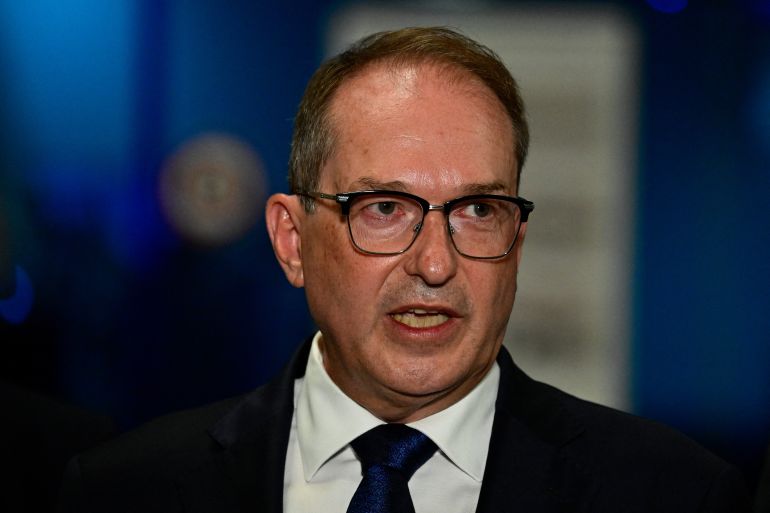 afp_6a73c981ac97-1785973121 German Interior Minister Alexander Dobrindt addresses a press conference on August 5, 2026 at the German airport Leipzig-Halle in Schkeuditz, eastern Germany, after an explosives-laden drone was found near a Ukrainian cargo plane.