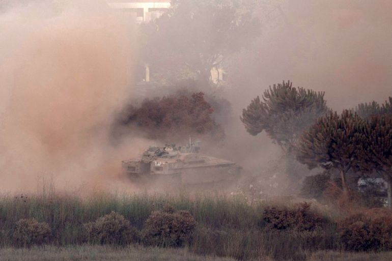 afp_6a76a47c5bba-1786160252 This photograph taken from the southern Lebanese village of Zawtar al-Gharbiyah shows an Israeli tank maneuvering in the nearby village of Zawtar al-Sharqiyah, on August 7, 2026.