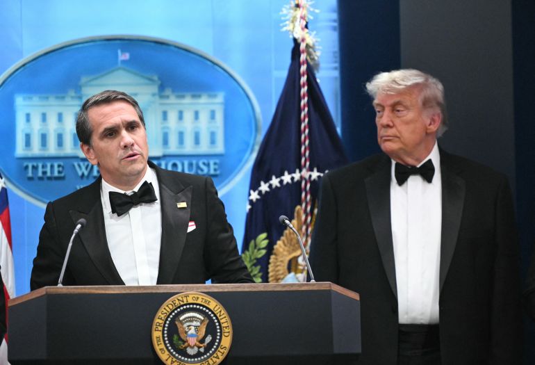 (FILES) Acting Attorney General Todd Blanche speaks as US President Donald Trump listens during a press briefing in the Brady Briefing Room at the White House in Washington, DC, shortly after a shooting incident at the White House Correspondents’ Dinner on April 25, 2026.