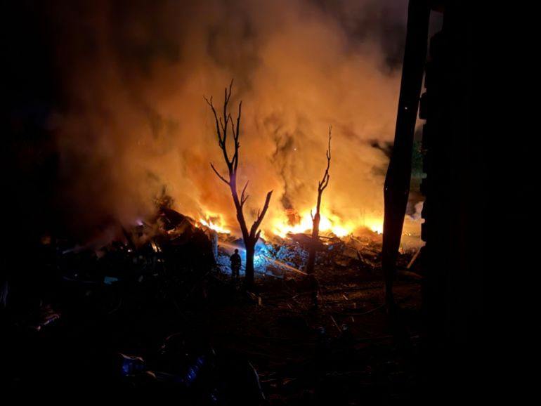 afp_6a7b67859efe-1786472325 An Ukrainian rescuer works at the site of a Russian strike in Zaporizhzhia on August 11, 2026, amid the Russian invasion of Ukraine. (Photo by Darya NAZAROVA / AFP)