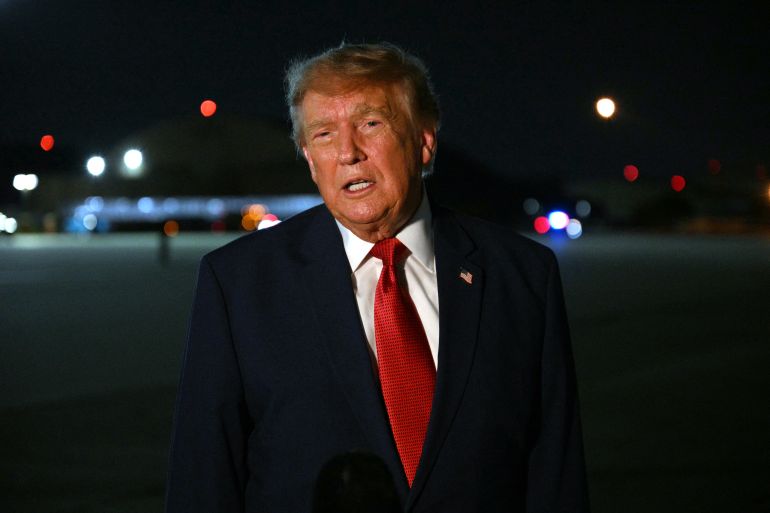 afp_6a7bc7a18a5e-1786496929 US President Donald Trump speaks with reporters after landing at Joint Base Andrews, Maryland, upon his return from Ohio where he attended the Patriot Games finals, on August 11, 2026.