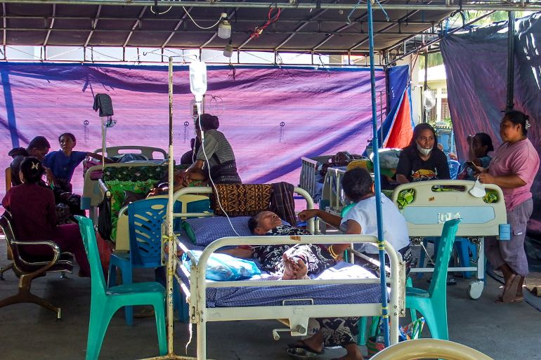afp_6a82f024b78e-1786966052 Patients received treatment under an emergency tent following aftershocks in the wake of a 7.7-magnitude earthquake, at the Santo Gabriel Kewapante Hospital in Sikka, East Nusa Tenggara, on August 17, 2026.