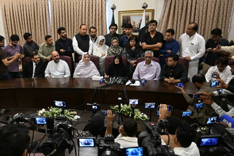 Pakistan's former prime minister Imran Khan's sisters Uzma Khan (Centre R) and Rubina Khan (Centre L) address a press conference regarding their brother's health following his medical examination, in Islamabad on August 21, 2026.
