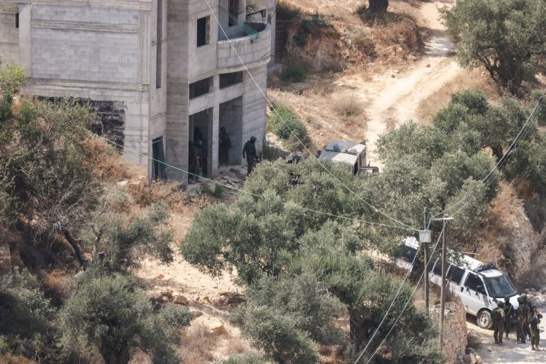 Israeli soldiers arrive at the scene where Israeli settlers attacked a Paletinian home in the village of Qusra, south of the city of Nablus in the Israeli-occupied West Bank, which has faced escalating Jewish settler violence over the past month, on August 29, 2026.