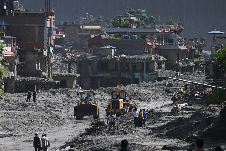 afp_6a9555d2cc1e-1788171730 TOPSHOT - Rescue works continue at Trishuli Center in Nepal's Nuwakot district on August 30, 2026, after catastrophic flooding on the Nepal-Tibet border.