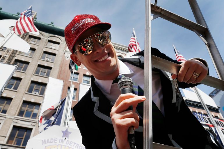 Milo Yiannopoulos address the crowd during the Straight Pride Parade in Boston, Saturday, Aug. 31, 2019. Several dozen marchers and about as many counter-demonstrators have gathered in Boston for a "straight pride" parade. The organizers say they believe straight people are an oppressed majority. (AP Photo/Michael Dwyer)