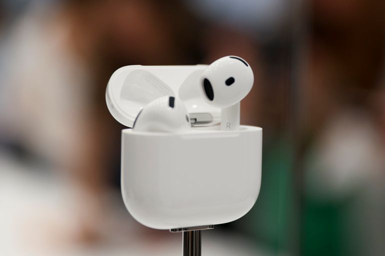 ap24253731025560-1726244980 AirPods are displayed during an announcement of new products at Apple headquarters Monday, Sept. 9, 2024, in Cupertino, Calif. (AP Photo/Juliana Yamada)