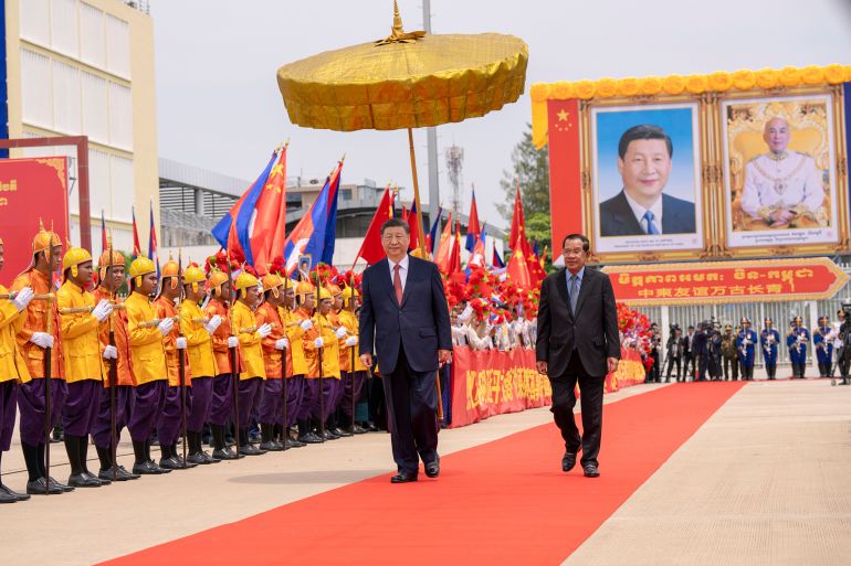 ap25108244912241-1746415962 In this photo released by Agence Kampuchea Press (AKP), Chinese President Xi Jinping reviews the Royal Palce honorary guards as he is accompanied by Cambodian Senate President Hun Sen, right, during a send-off ceremony at Phnom Penh International Airport in Phnom Penh, Cambodia, Friday, April 18, 2025. (AKP via AP)