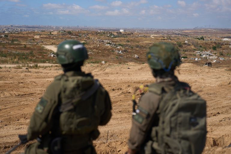 ap26146678560200-1780346565 Israeli soldiers occupy a military position overlooking the so-called Yellow Line in the central Gaza Strip, Tuesday, May 26, 2026. (AP Photo/Ariel Schalit)