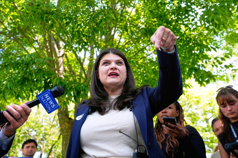 Rep. Haley Stevens, D-Mich., a candidate in the Democratic primary for U.S. Senate in Michigan, talks to the media after voting at the Baldwin Public Library, Tuesday, Aug. 4, 2026, in Birmingham, Mich. (AP Photo/Paul Sancya)