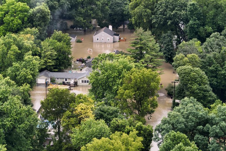 This aerial photo provided by the Indianapolis Fire Department shows flooding in northern Indianapolis, Ind., Saturday, Aug. 15, 2026. (Indianapolis Fire Department via AP)