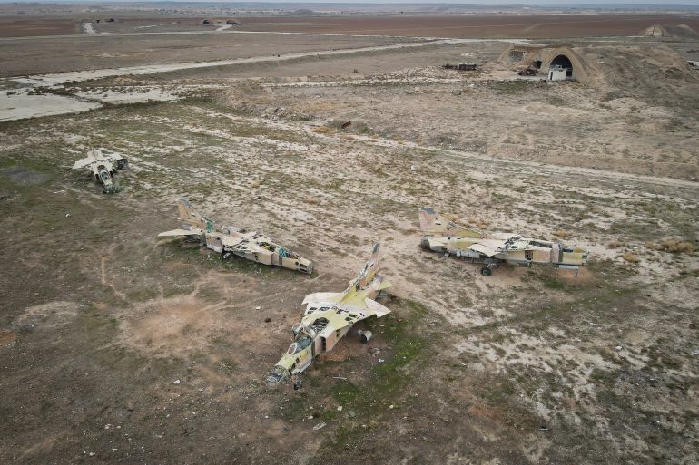ap_6a888852a7efe-1787332690 FILE - Decommissioned Syrian air force planes are seen at the Abu Duhur military air base east of Idlib, following the takeover of the area by Syrian opposition fighters on Saturday, Dec. 7, 2024. (AP Photo/Omar Albam, File)