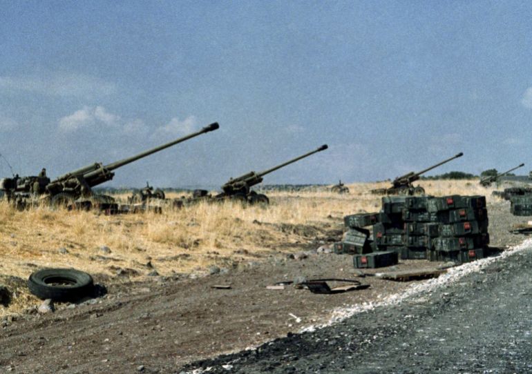 ap_6a8c3277dc868-1787572855 Israeli howitzers in position on the Golan Heights ready to support the Israeli armored drive into Syria, in October 1973. (AP Photo)