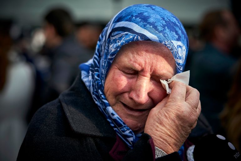 ap_6a9076c688a82-1787852486 FILE - Nura Mustafic, one of the Mothers of Srebrenica and other Bosnian organizations, wipes away tears as she reacts to the verdict which the Yugoslav War Crimes Tribunal, ICTY, handed down in the genocide trial against former Bosnian Serb military chief Ratko Mladic, in The Hague, Netherlands, Wednesday Nov. 22, 2017. (AP Photo/Phil Nijhuis, File)