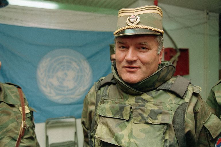 ap_6a9076d77309d-1787852503 FILE - Serb commander Gen. Ratko Mladic is pictured near a United Nations flag at Sarajevo Airport, May 17, 1993. (AP Photo/Jerome Delay, File)