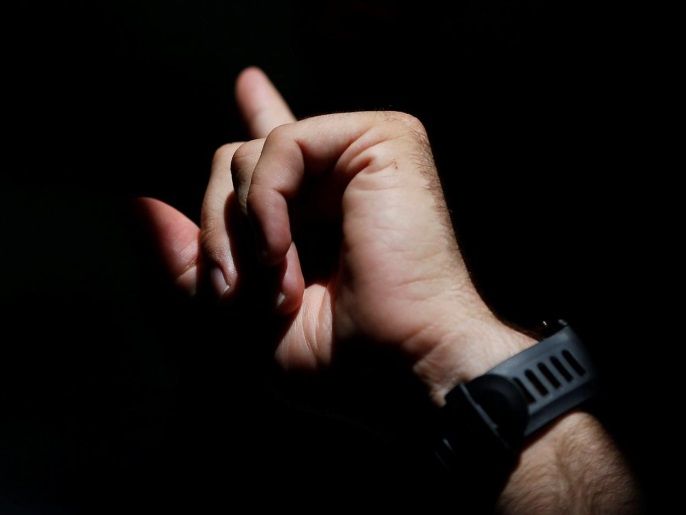 c134b195-5042-4f22-be33-01fe97dba393 Sergio Colas uses sign language while having lunch with other deaf friends during the start of the San Fermin festival in Pamplona, northern Spain, July 6, 2016. REUTERS/Susana Vera SEARCH "SERGIO COLAS" FOR THIS STORY. SEARCH "THE WIDER IMAGE" FOR ALL STORIES.
