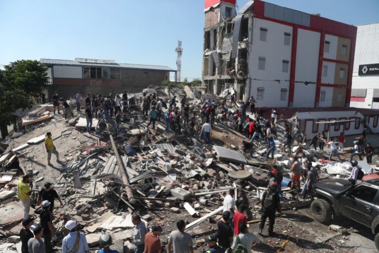 download-6-1786438641 Residents and rescue workers search through the rubble of a collapsed building after an earthquake struck Cali, Colombia, Monday, Aug. 10, 2026. (AP Photo/Santiago Saldarriaga)