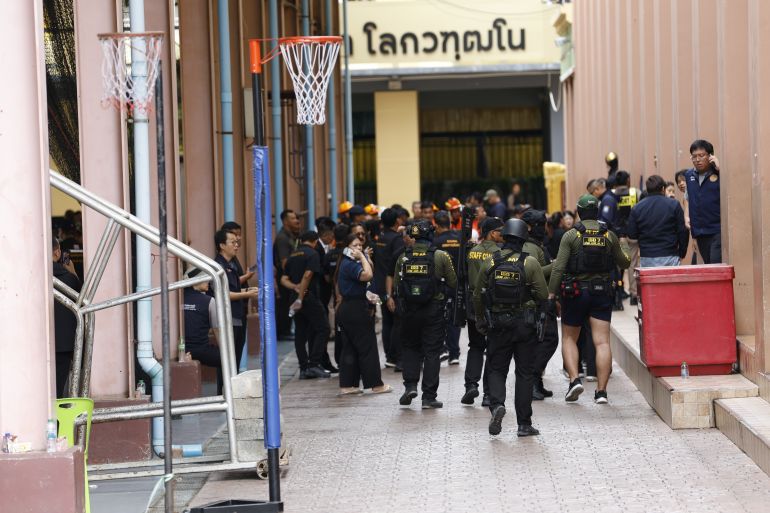 epa13154908 Police officers respond to a school shooting as at Debsirin Nonthaburi School in Bang Kruai district, Nonthaburi province, Thailand, 07 August 2026. Several people were killed and injured after a student opened fire inside the school campus, according to the Royal Thai Police. EPA/RUNGROJ YONGRIT