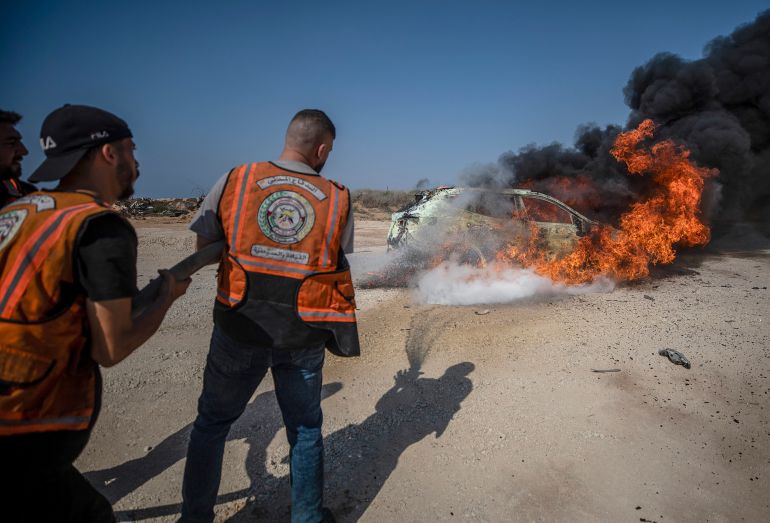 epa_6a7e0f1fdd60-1786646303 epaselect epa13166837 Palestinian firefighters attempt to extinguish a fire after an Israeli military strike targeted a vehicle belonging to Gaza Police Chief Jamal Abu Kmeil south of Gaza City, 13 August 2026. According to a report by the Ministry of Health in Gaza, Abu Kmeil and another person were killed in the Israeli airstrike. EPA/MOHAMMED SABER