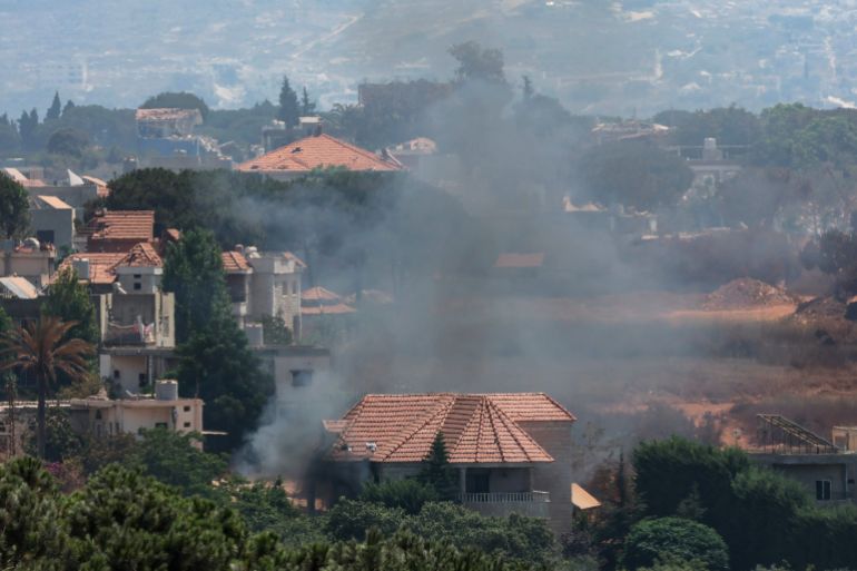 epa_6a7f1826db8e-1786714150 epa13166683 Fire rages in a house after Israeli forces set it on fire in the village of Zawtar al-Sharqiyah, as seen from the village of Zawtar al-Gharbiya, southern Lebanon, 13 August 2026. Zawtar al-Gharbiya is among the designated pilot zones under the ceasefire agreement between Lebanon and Israel, from which Israeli forces have withdrawn. EPA/WAEL HAMZEH