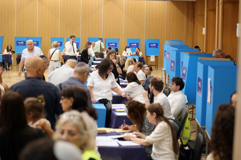 epa13175327 Likud Party members cast their votes for the party's primary list in Jerusalem, 17 August 2026. The primary will determine Likud's candidate list for the upcoming Knesset election. EPA/ABIR SULTAN