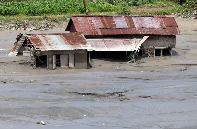 epa13200023 A submerged home is seen following flash floods along the banks of the Trishuli River in Dhading district, Nepal, 30 August 2026. More than 700 people were killed, and hundreds remain missing across northern Nepal after a glacial collapse and avalanche triggered flash floods and mudslides along the Bhotekoshi and Trishuli river valleys near the Nepal-Tibet border, causing widespread destruction to settlements and infrastructure, according to the National Disaster Risk Reduction and Management Authority (NDRRMA). EPA/NARENDRA SHRSTHA